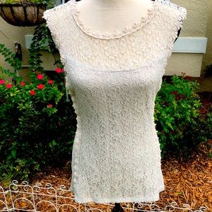 Express off white, stretchy, blouse with lace bodice in front. Size small